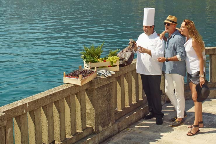 Seabourn Style - Shopping with the Chef. A background of red ripe strawberries.